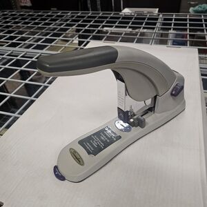 Swingline LightTouch Heavy-Duty desktop stapler in gray.